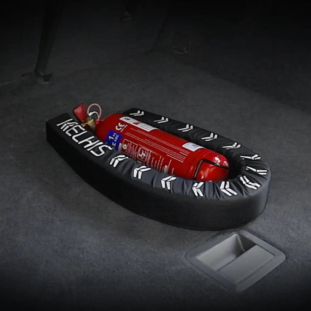 FlexiStick holding fire extinguisher securely against trunk floor